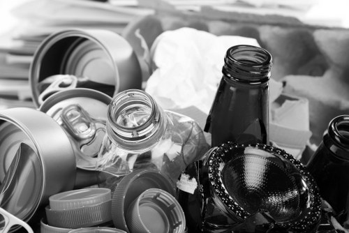 Operatives preparing for a house clearance on site with protective gear