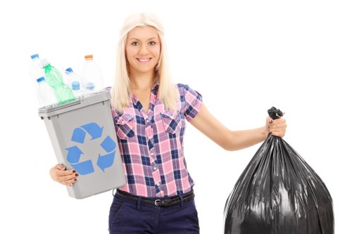 Workers loading recyclable materials at a Hertfordshire transfer station